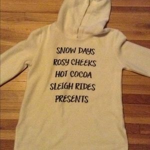 A fleece sweatshirt with black letters